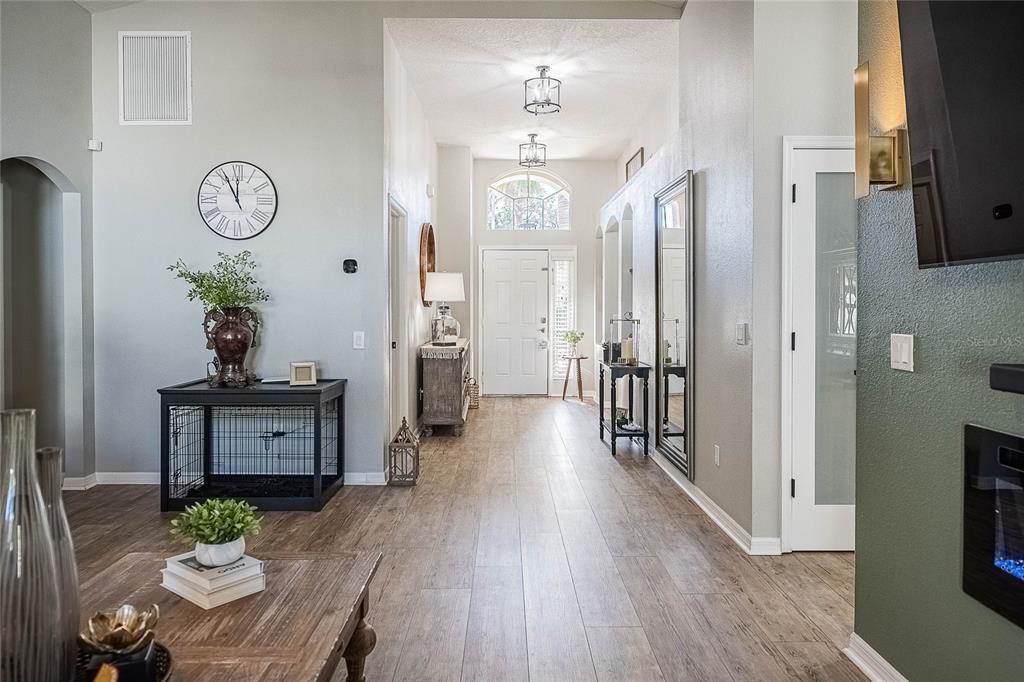 2524 Siena Way Valrico, FL 33596 - Photo 5 of 38 a living room with furniture and wooden floor