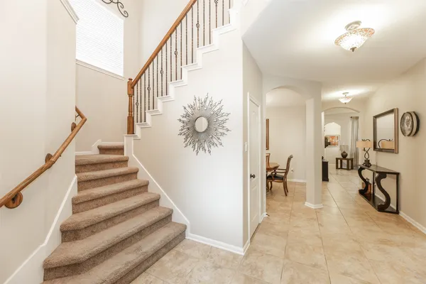a view of entryway with wooden floor