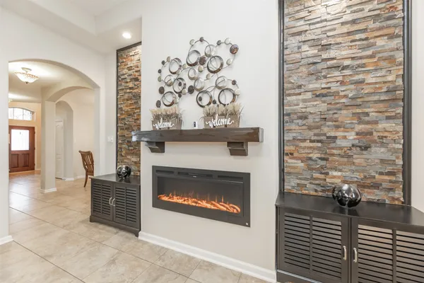 a living room with a fireplace