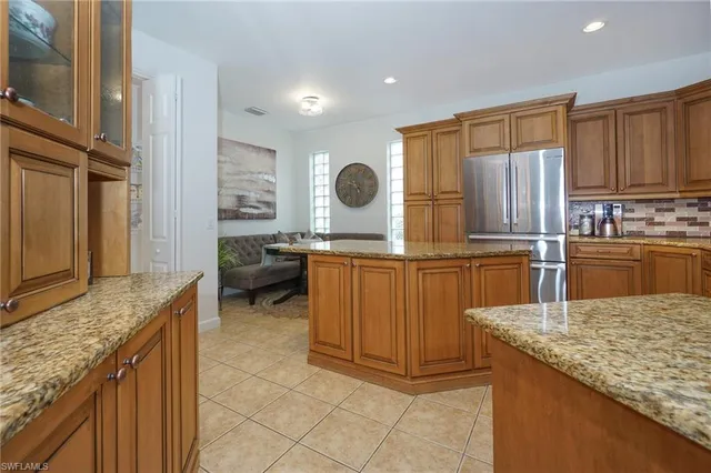 a view of a dining room with furniture and a table