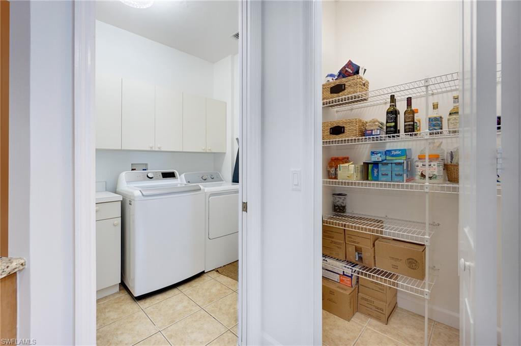 3188 Sundance Circle Naples, FL 34109 - Photo 21 of 39 a room with storage and utility