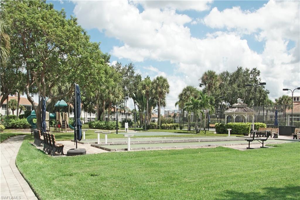 3188 Sundance Circle Naples, FL 34109 - Photo 39 of 39 a view of a park with large trees
