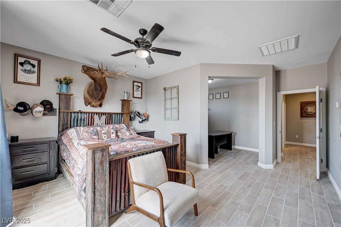 4045 River Heights Lane Logandale, NV 89021 - Photo 14 of 38 Bedroom featuring light wood-type flooring and cei