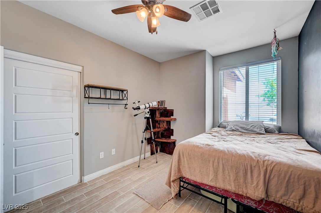 4045 River Heights Lane Logandale, NV 89021 - Photo 20 of 38 Bedroom with light wood-type flooring and a ceilin