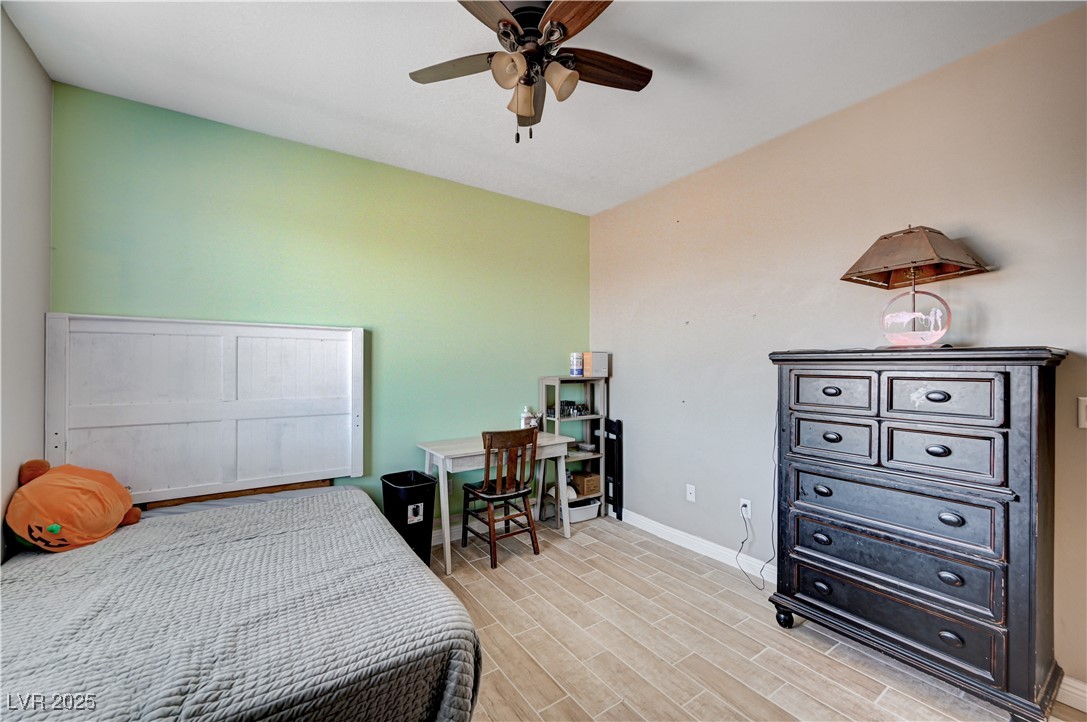 4045 River Heights Lane Logandale, NV 89021 - Photo 23 of 38 Bedroom with light wood-style flooring and ceiling