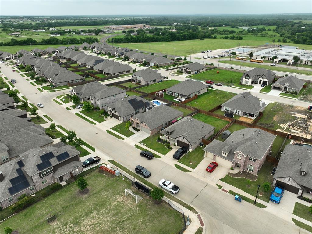 1084 Imperial Eagle Road Alvarado, TX 76009 - Photo 34 of 39 an aerial view of a city with lots of residential buildings