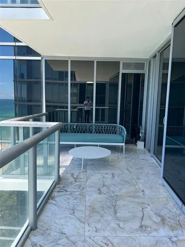 a view of a house with a porch