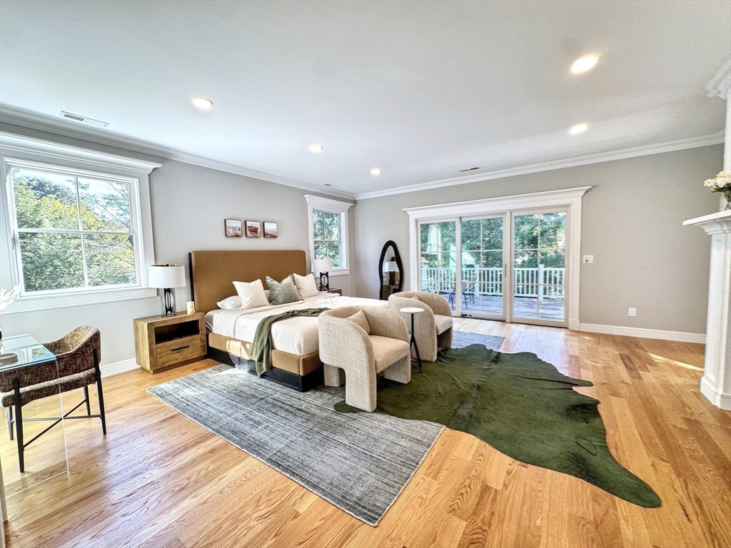 18 Sprague Road Wellesley, MA 02481 - Photo 18 of 35 a bed room with a bed and a couch