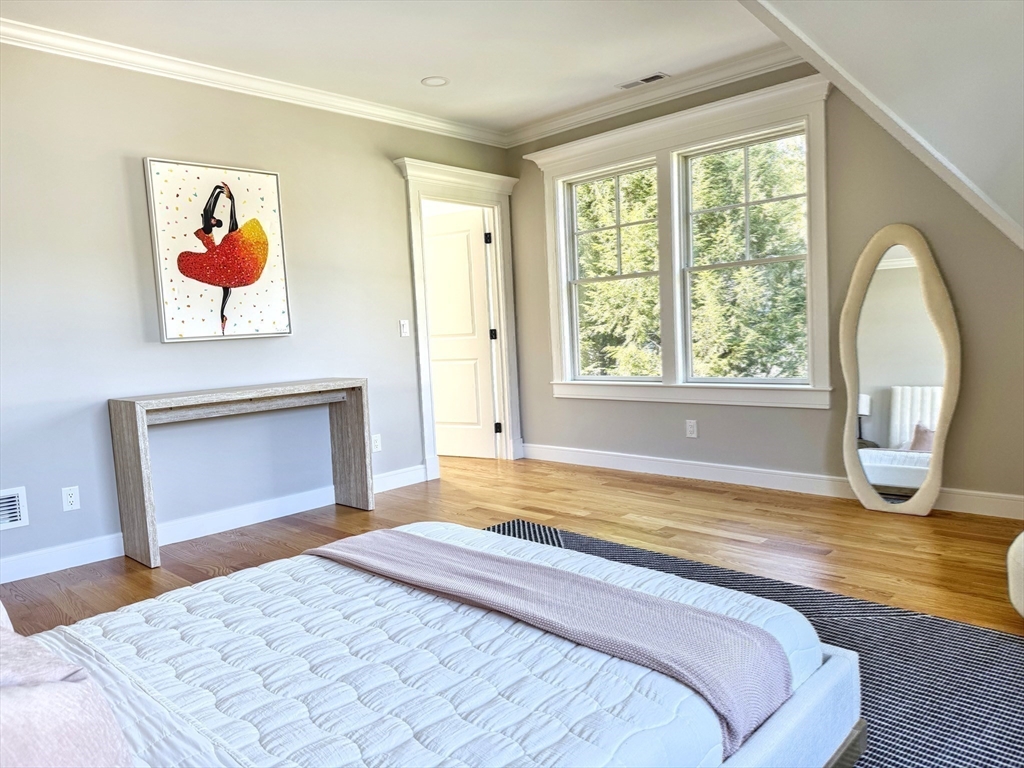 18 Sprague Road Wellesley, MA 02481 - Photo 26 of 35 a bedroom with a bed and a window