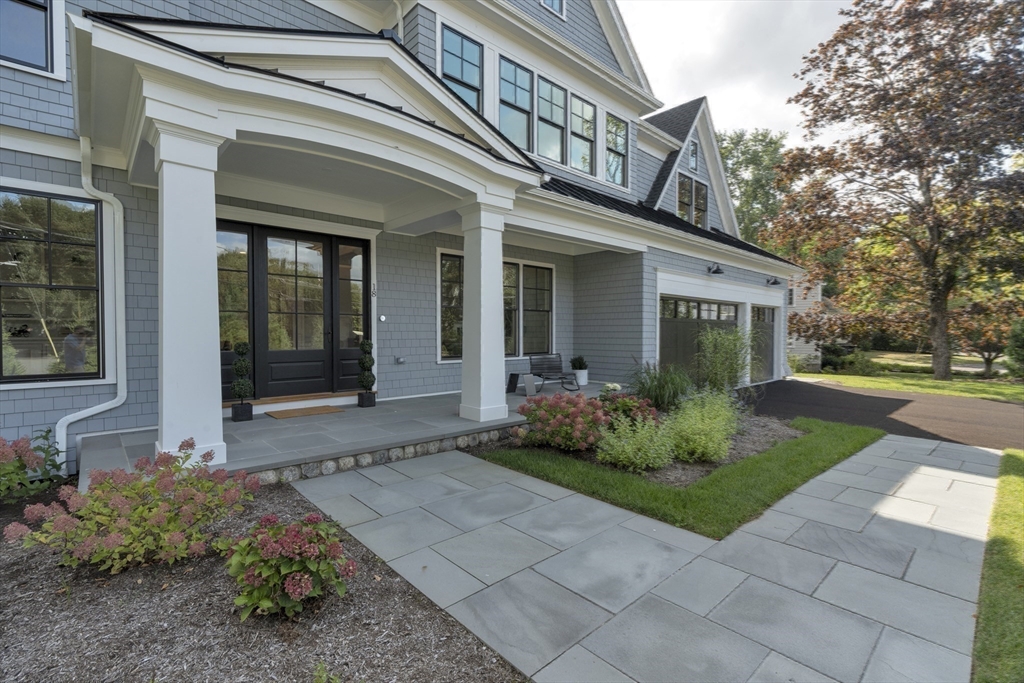 18 Sprague Road Wellesley, MA 02481 - Photo 29 of 35 a front view of a house with garden