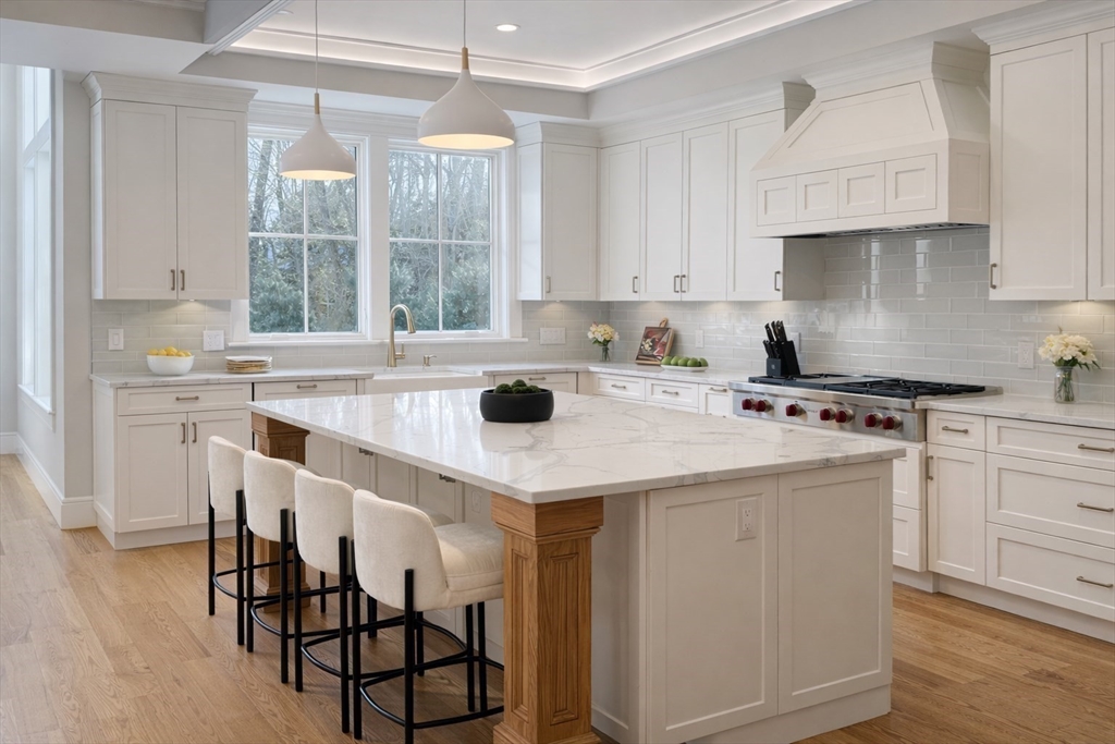 18 Sprague Road Wellesley, MA 02481 - Photo 10 of 35 a kitchen with appliances cabinets and wooden floor