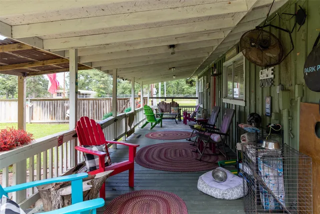 a view of outdoor dining space with furniture and outdoor view