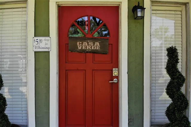 a view of a balcony with chairs