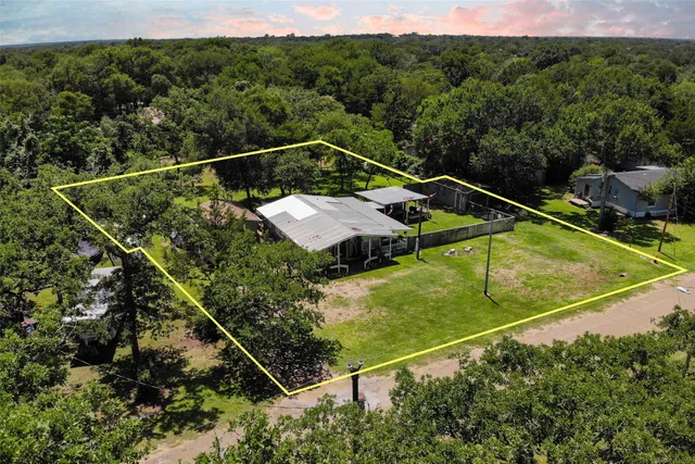 a view of a balcony with two chairs
