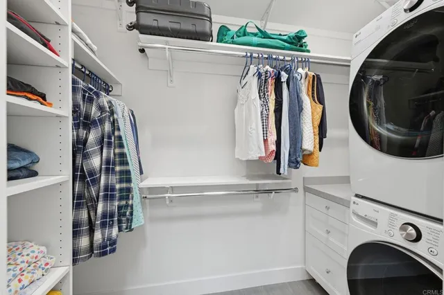 a view of a patio with a table chairs and a umbrella