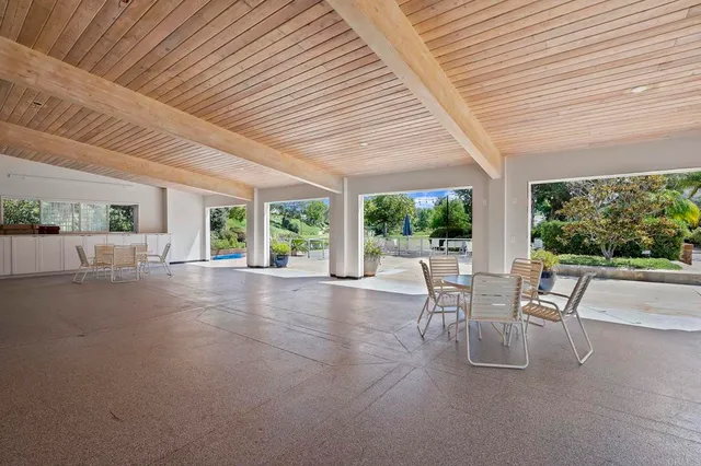 a wooden bench sitting in the middle of a lake