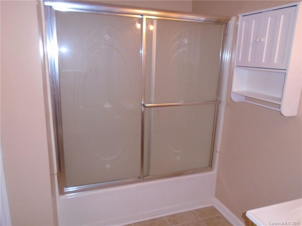 1260 Wayfield Road, Unit 3 Clover, SC 29710 - Photo 16 of 24 a bathroom with a glass shower door