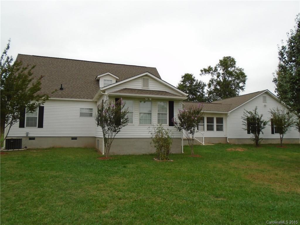 1260 Wayfield Road, Unit 3 Clover, SC 29710 - Photo 21 of 24 a front view of a house with a garden