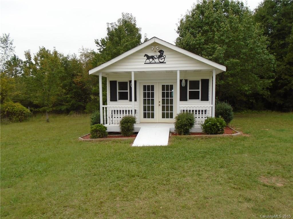 1260 Wayfield Road, Unit 3 Clover, SC 29710 - Photo 22 of 24 a front view of a house with a yard
