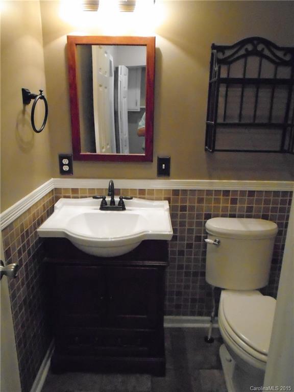 1260 Wayfield Road, Unit 3 Clover, SC 29710 - Photo 6 of 24 a bathroom with a sink a toilet and a mirror