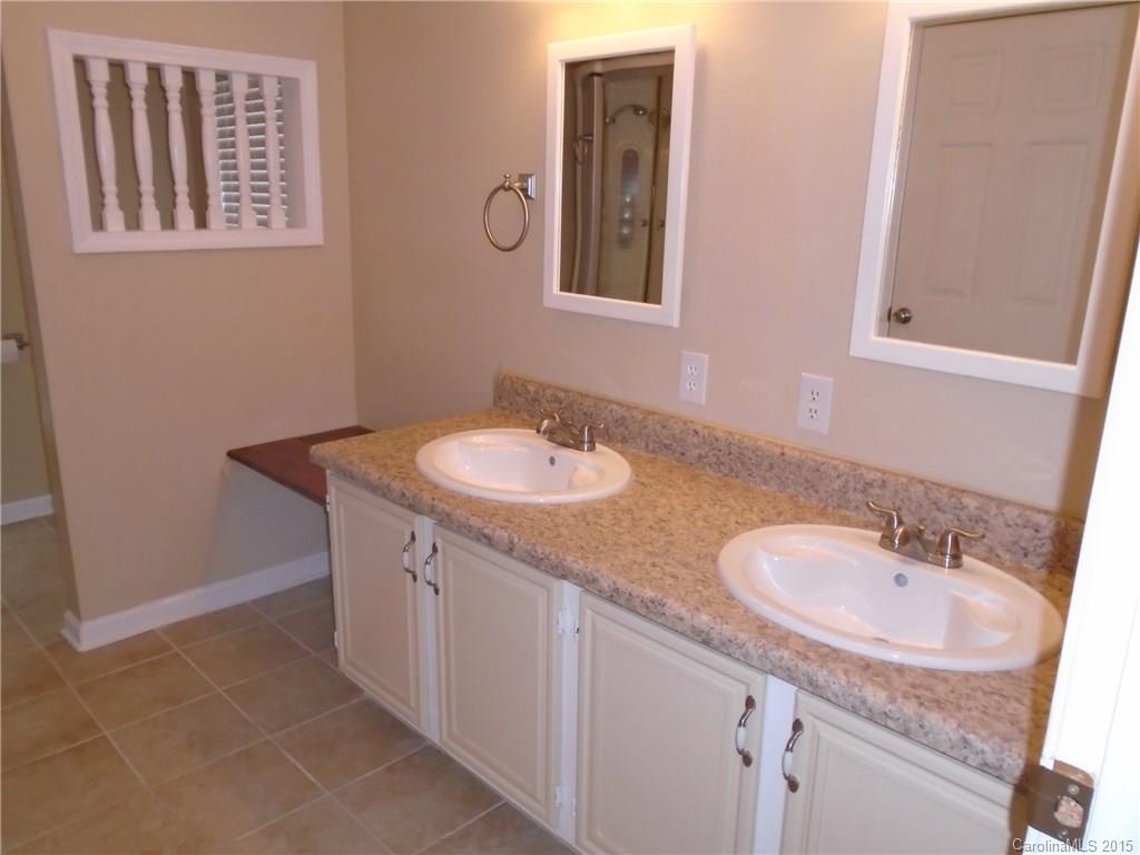 1260 Wayfield Road, Unit 3 Clover, SC 29710 - Photo 10 of 24 a bathroom with a sink and a mirror