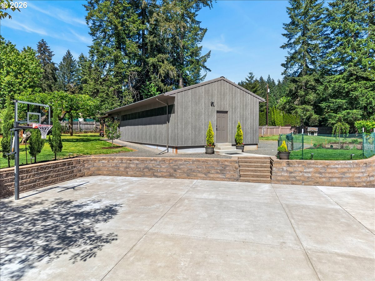 28311 Northwest Nowakowski Road Buxton, OR 97109 - Photo 47 of 48 a view of backyard of house and trees around