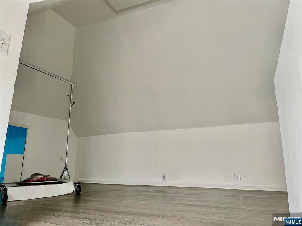 46 Webster Street, Unit 2 Ridgefield Park, NJ 07660 - Photo 9 of 10 a view of room with a floor to ceiling window