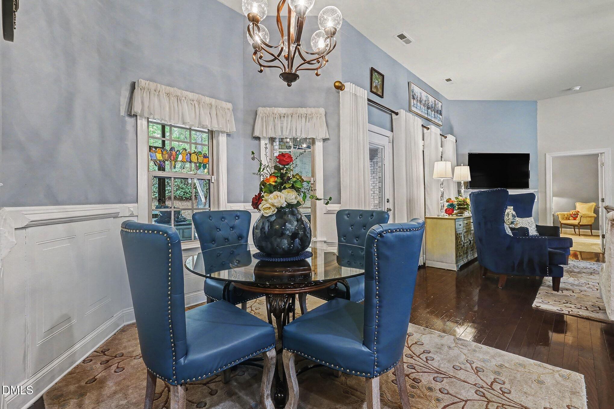 128 Dereham Lane Garner, NC 27529 - Photo 11 of 29 a view of a dining room with furniture