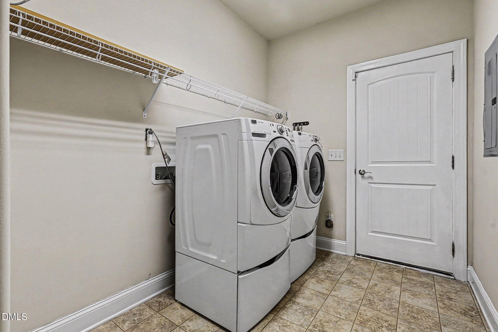 128 Dereham Lane Garner, NC 27529 - Photo 23 of 29 a utility room with dryer and washer