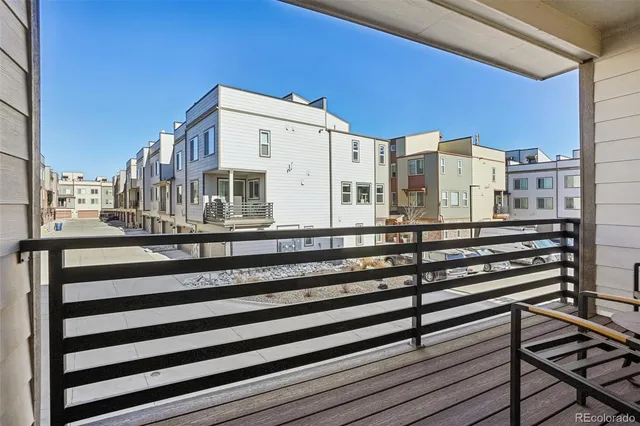 a spacious bathroom with a shower sink and mirror