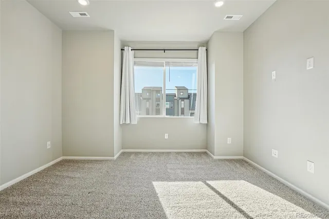 a view of a terrace with seating space