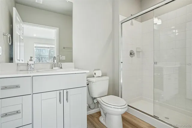 a front view of a building with a road