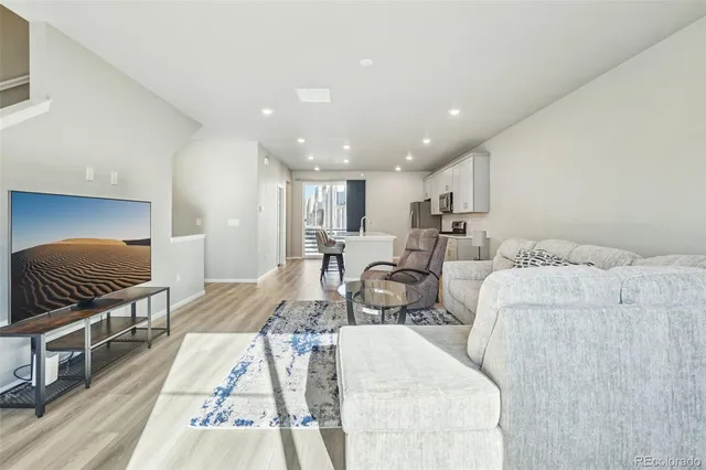 a view of a balcony with chairs