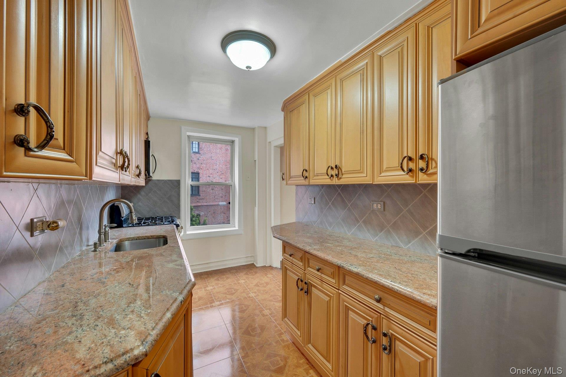 280 Bronxville Road, Unit 5X Bronxville, NY 10708 - Photo 14 of 31 Bright Kitchen with granite counter tops