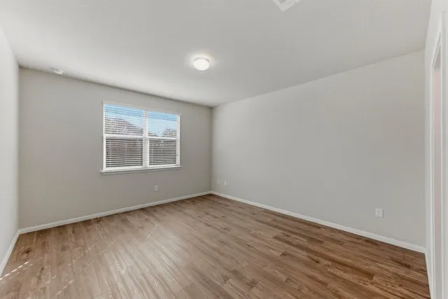 a kitchen with granite countertop a sink stainless steel appliances and cabinets