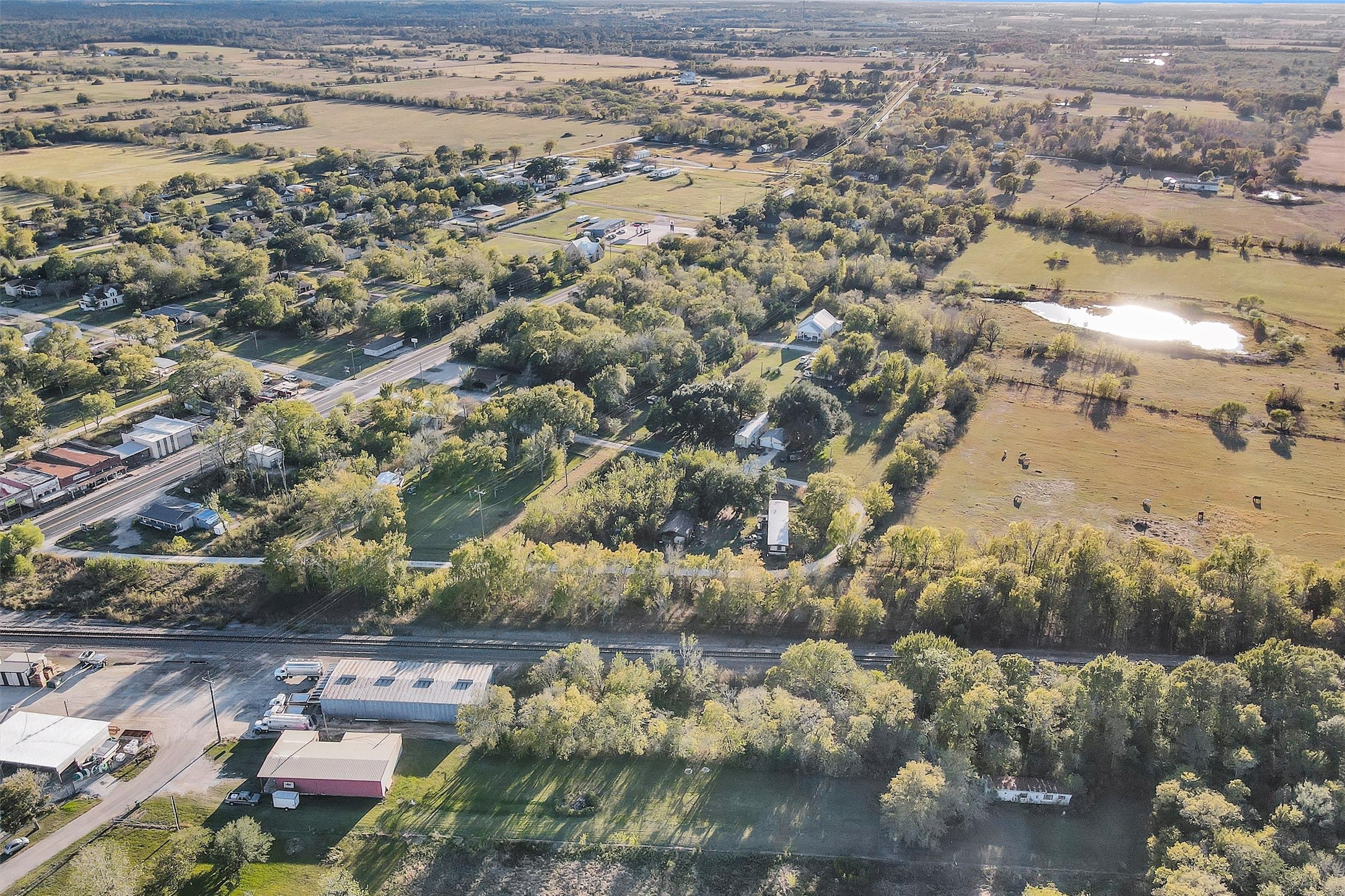 6821 Bailey Street Shiro, TX 77831 - Photo 31 of 35 an aerial view of residential houses with outdoor space