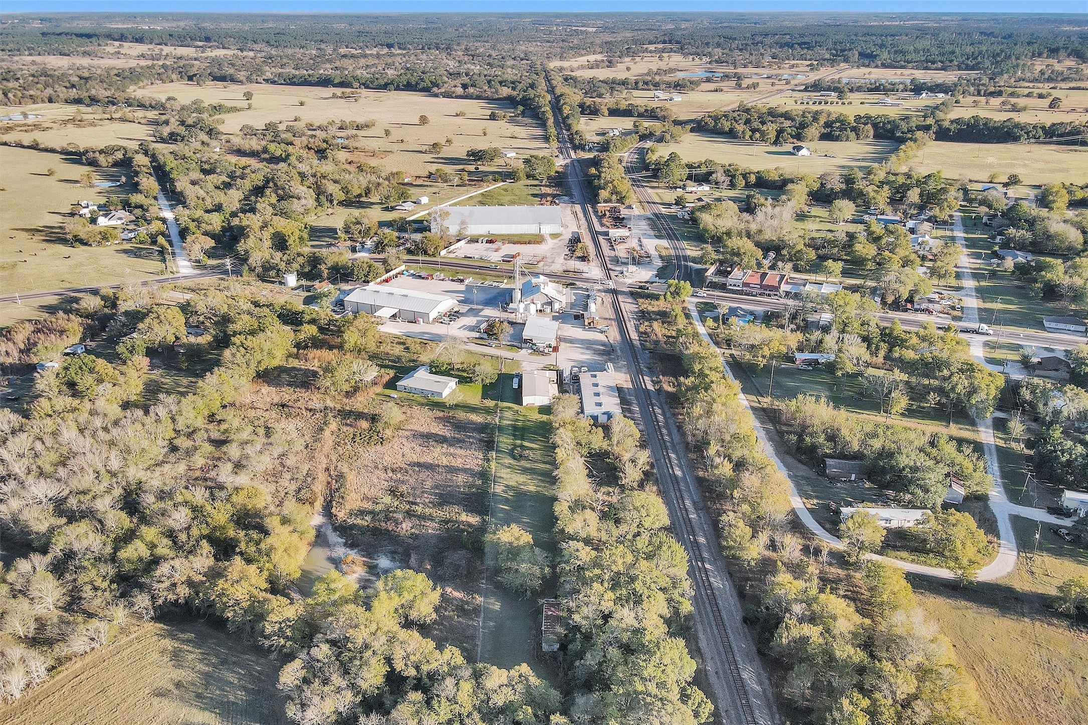 6821 Bailey Street Shiro, TX 77831 - Photo 32 of 35 an aerial view of residential building with parking space