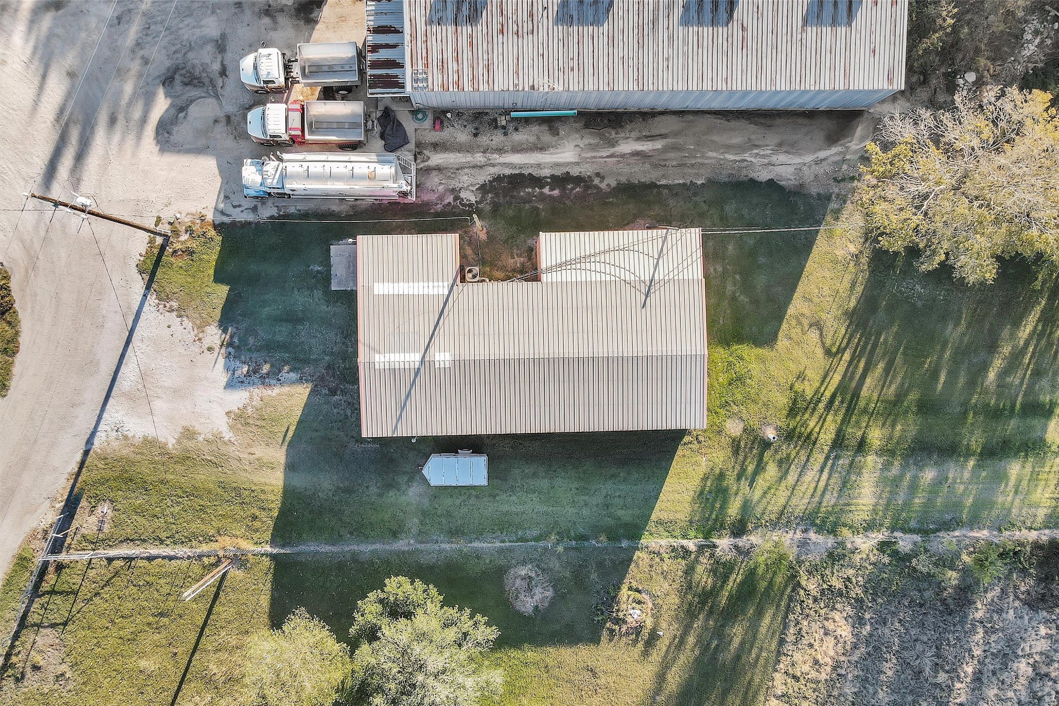 6821 Bailey Street Shiro, TX 77831 - Photo 35 of 35 a aerial view of a house with a yard