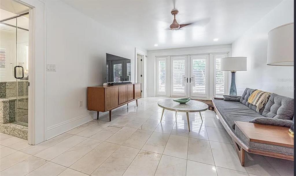 1175 Jackson Road Clearwater, FL 33755 - Photo 13 of 23 a living room with furniture and wooden floor