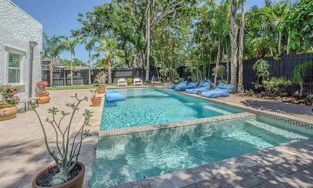 1175 Jackson Road Clearwater, FL 33755 - Photo 5 of 23 a view of a backyard with sitting area