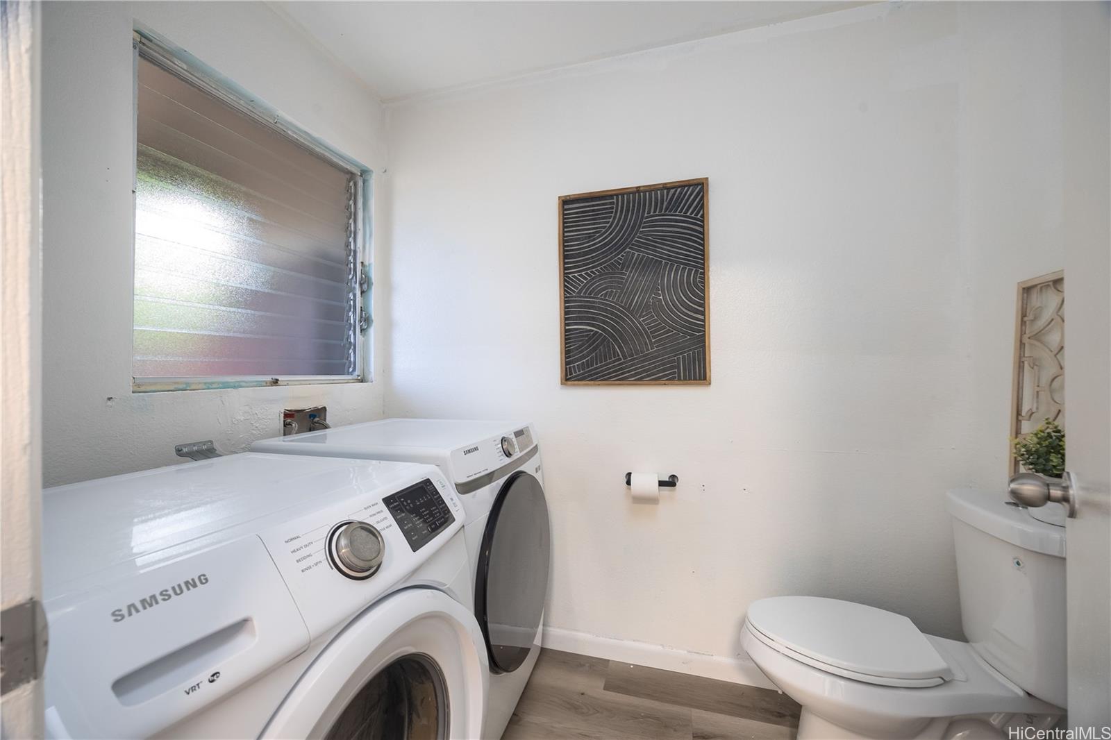 92-1014 Makakilo Drive, Unit 38 Kapolei, HI 96707 - Photo 15 of 21 Downstairs bathroom with full size laundry