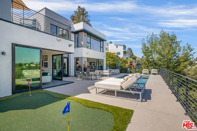 a view of a terrace with chairs