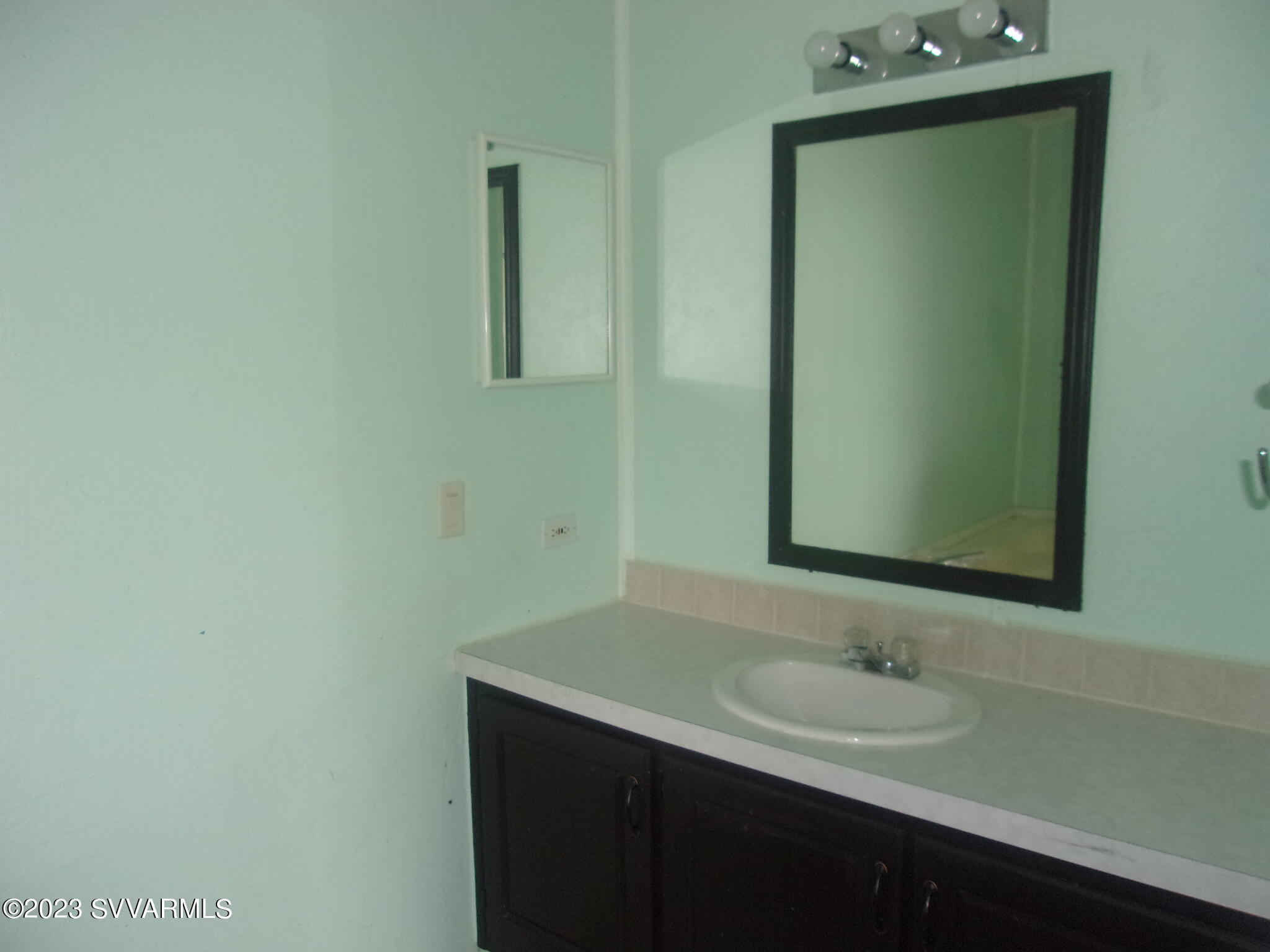 5925 Point Of View Trail Rimrock, AZ 86335 - Photo 15 of 35 a bathroom with a sink and a mirror