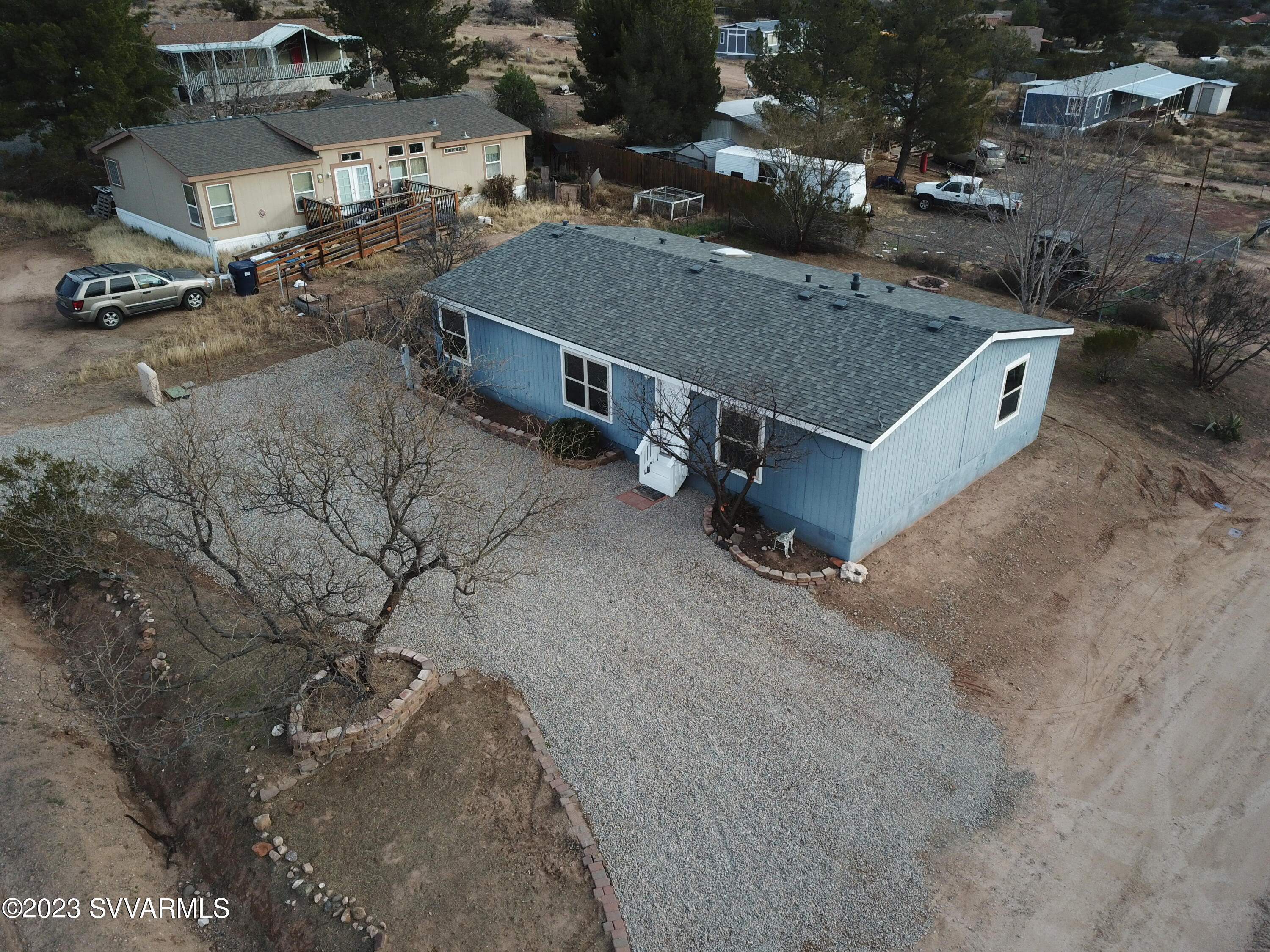 5925 Point Of View Trail Rimrock, AZ 86335 - Photo 30 of 35 an aerial view of a house with a yard and parking space