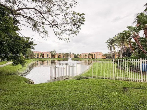 a view of a garden and lake