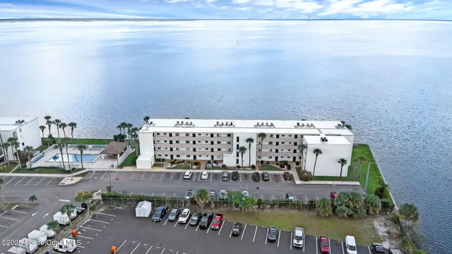 an aerial view of a house with outdoor space