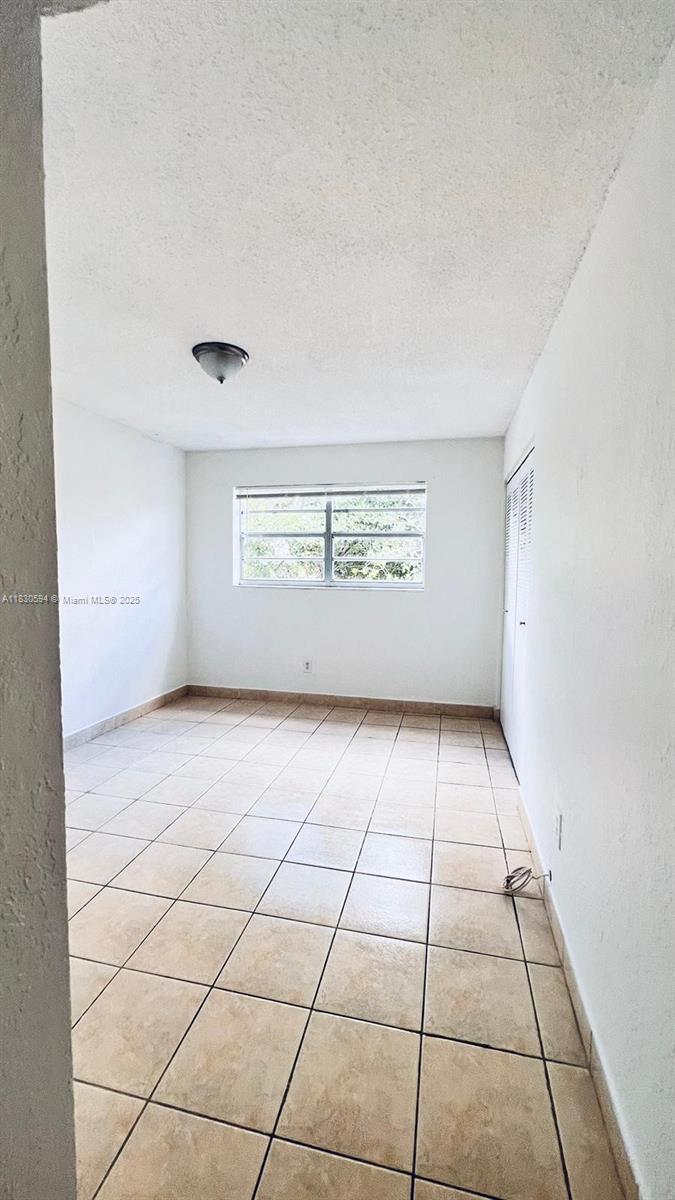 1305 West 53rd Street, Unit 406 Hialeah, FL 33012 - Photo 10 of 14