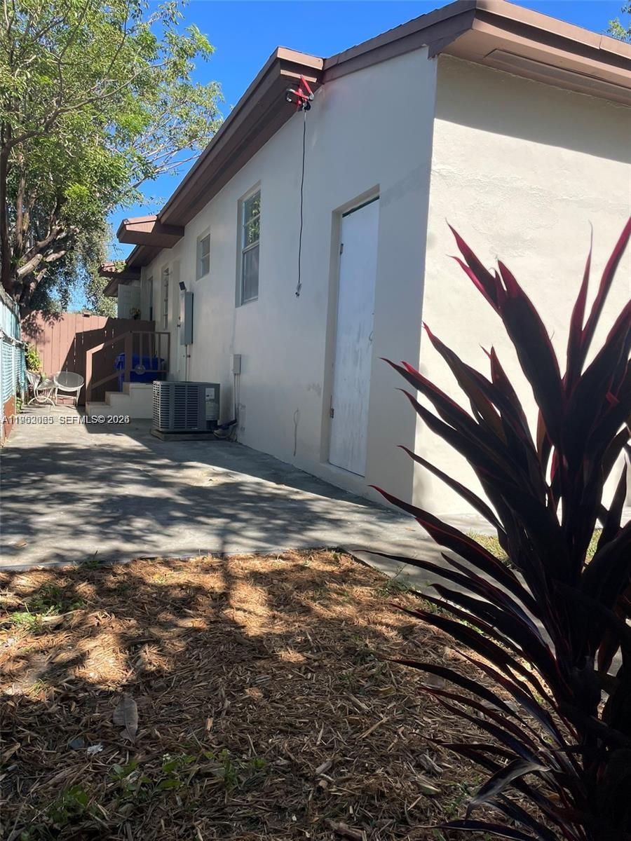 1790 Northwest 19th Street Miami, FL 33125 - Photo 5 of 6 a view of a house with a house