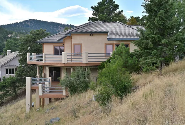 a house that has a lot of plants in it