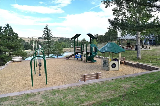 an aerial view of a garden with lawn chairs